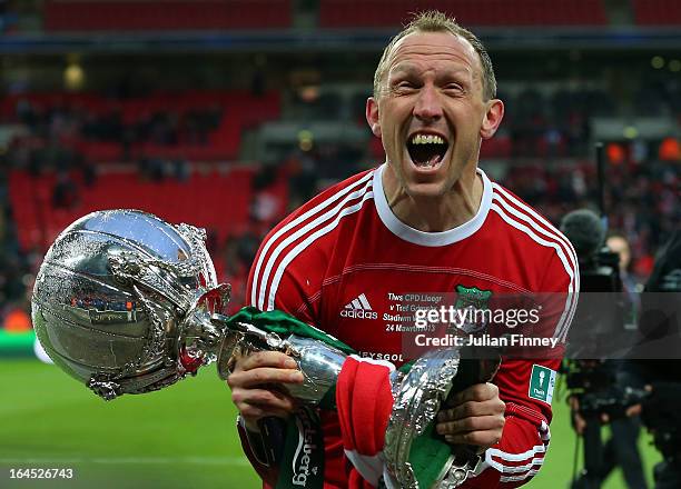 Wrexham player manager Andy Morrell celebrates with the trophy during the FA Trophy Final match between Wrexham and Grimsby Town at Wembley Stadium...