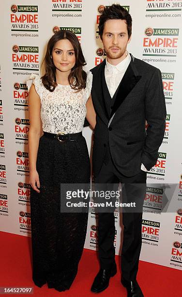 Jenna Louise Coleman and Tom Riley pose in the press room at the Jameson Empire Awards 2013 at The Grosvenor House Hotel on March 24, 2013 in London,...