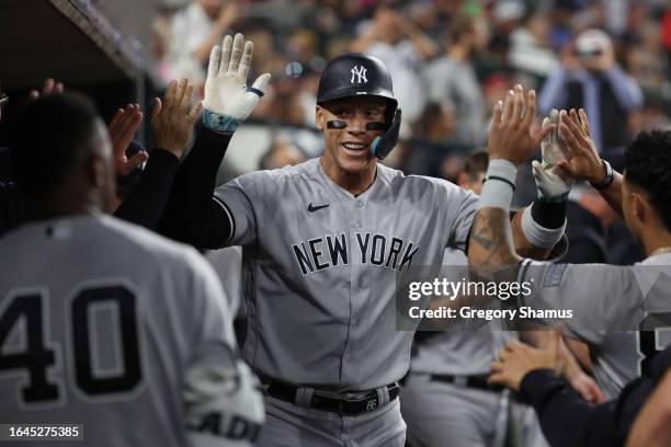 Aaron Judge of the New York Yankees celebrates his solo home run in the seventh inning while playing the Detroit Tigers at Comerica Park on August...