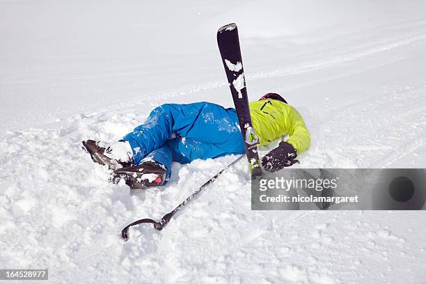 skiing accident - skiing accident stock pictures, royalty-free photos & images