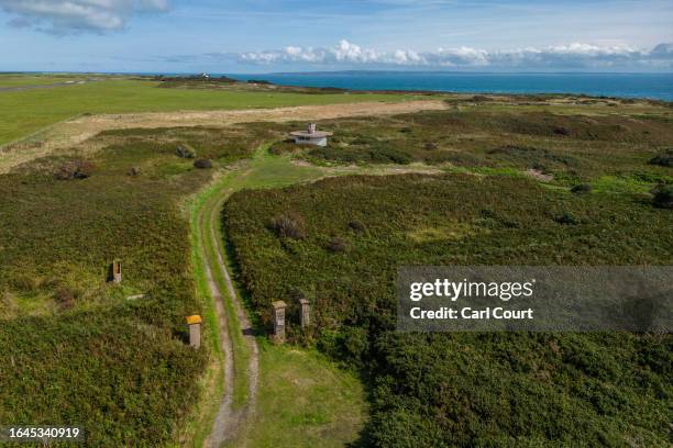 Gate posts mark the entrance to Lager Sylt Nazi concentration camp, one of four camps that were built on Alderney during World War II, on September...