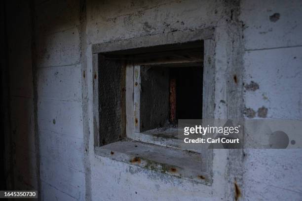 Machine gun window looks out from a Nazi bunker, on September 1, 2023 in Alderney, Guernsey. This year, the British government is expected to...