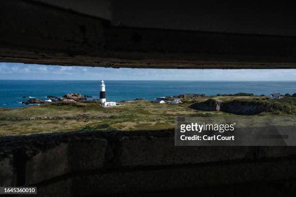 Quesnard Lighthouse is seen from a viewing hatch on The Odeon, a 15-metre high, concrete naval range-finding tower that was built by forced labourers...