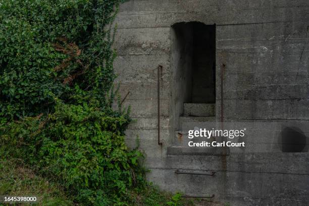 Steps lead into a Nazi bunker on September 3, 2023 in Alderney, Guernsey. This year, the British government is expected to formally announce an...