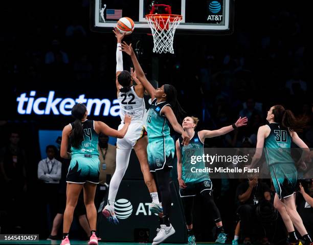 Ja Wilson of the Las Vegas Aces puts up a shot against Jonquel Jones of the New York Liberty at Barclays Center on August 28, 2023 in New York City.