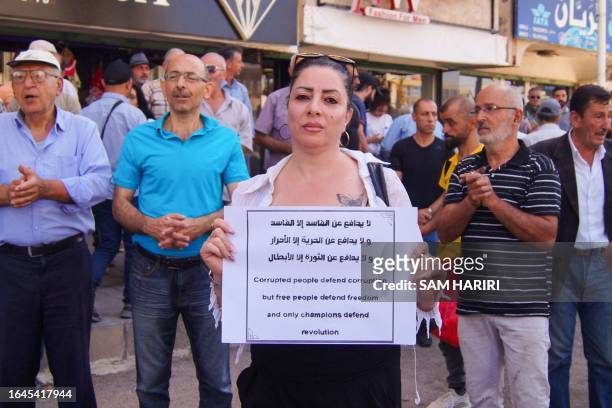 People protest in the Syria's southern city of Sweida on September 5, 2023. The protests in Sweida province, the heartland of the country's Druze...