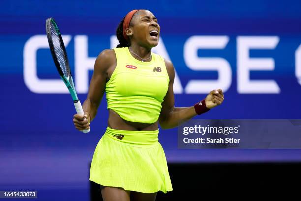 Coco Gauff of the United States celebrates after match point against Laura Siegemund of Germany during their Women's Singles First Round match on Day...