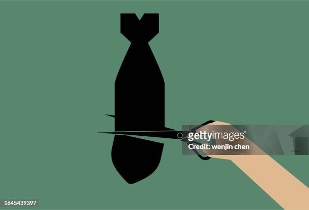 stockillustraties, clipart, cartoons en iconen met cut the bomb with scissors, anti war, peace poster. - anti nuclear demonstration
