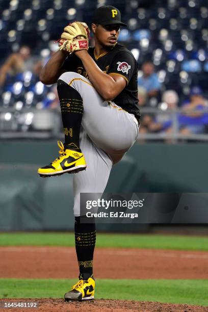 Johan Oviedo of the Pittsburgh Pirates throws in the ninth inning against the Kansas City Royals at Kauffman Stadium on August 28, 2023 in Kansas...