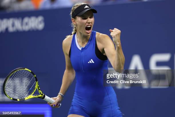 Caroline Wozniacki of Denmark celebrates match point against Tatiana Prozorova during their Women's Singles First Round match on Day One of the 2023...