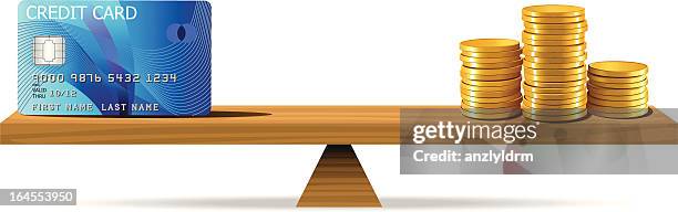 gold coins and credit card on a teeterboard - stacking coins stock illustrations