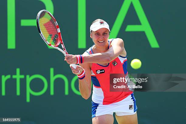 Nadia Petrova of Russia returns a shot to Jelena Jankovic of Serbia during Day 7 of the Sony Open at the Crandon Park Tennis Center on March 24, 2013...