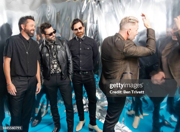 Brad Tursi, Matthew Ramsey, Geoff Sprung, and Trevor Rosen of Old Dominion pose for People Magazine at the 57th Academy of Country Music Awards at...