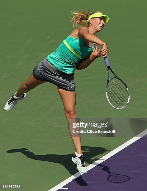 Maria Sharapova of Russia serves against Elena Vesnina of Russia during their third round match at the Sony Open at Crandon Park Tennis Center on...