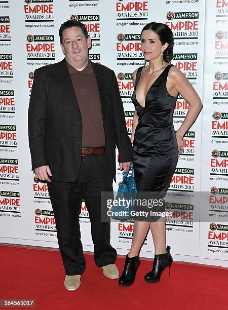Johnny Vegas and Maia Dunphy are pictured arriving at the Jameson Empire Awards at Grosvenor House on March 24, 2013 in London, England. Renowned for...