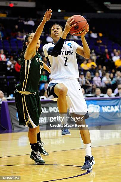 Dara Taylor of the Penn State Lady Lions takes a shot against Ariana Elegado of the Cal Poly Mustangs during the first round of the NCAA Tournament...