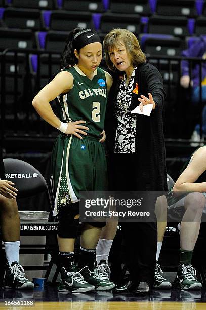 Faith Mimnaugh, head coach of the Cal Poly Mustangs speaks with Ariana Elegado during the first round of the NCAA Tournament against the Penn State...