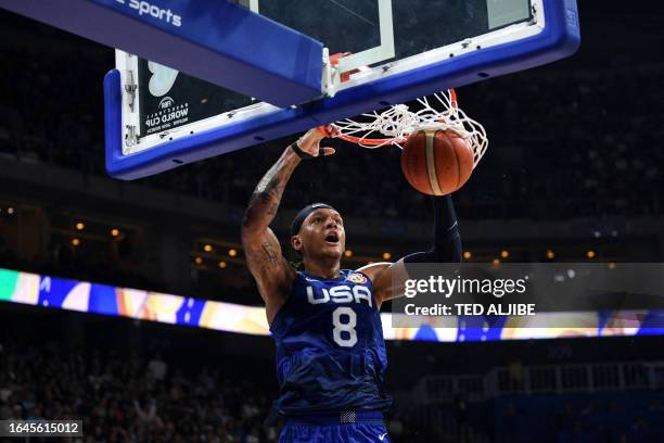 S Paolo Banchero dunks the ball during the FIBA Basketball World Cup quarter-final match between USA and Italy in Manila on September 5, 2023.