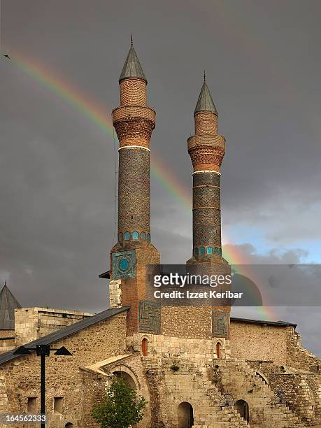 rainbow on double minaret madrasah - sivas stock-fotos und bilder