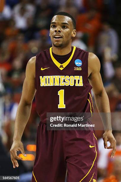 Andre Hollins of the Minnesota Golden Gophers reacts in the second half against the Florida Gators during the third round of the 2013 NCAA Men's...