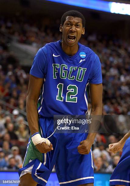 Eric McKnight of the Florida Gulf Coast Eagles reacts after a blocked shot in the first half against the San Diego State Aztecs during the third...