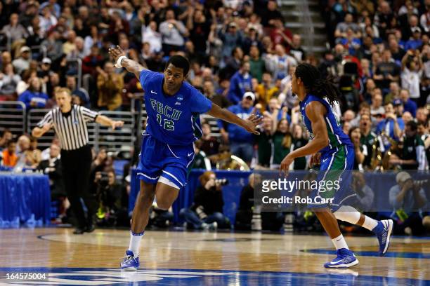 Eric McKnight of the Florida Gulf Coast Eagles celebrates in the second half while taking on the San Diego State Aztecs during the third round of the...