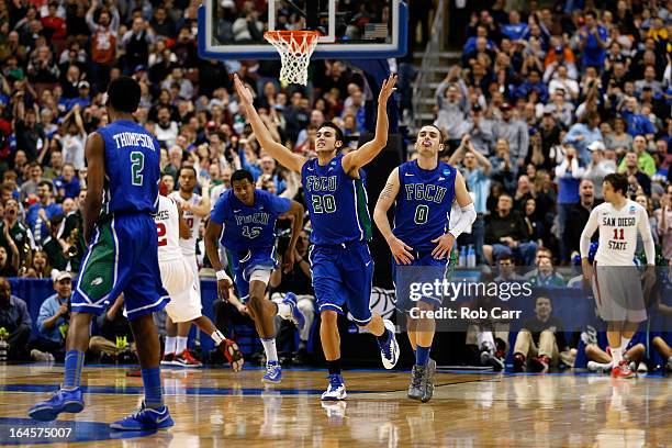 Chase Fieler and Brett Comer of the Florida Gulf Coast Eagles celebrate in the second half while taking on the San Diego State Aztecs during the...