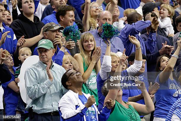 Amanda Marcum, the wife of head coach Andy Enfield of the Florida Gulf Coast Eagles, watches in the second half against the San Diego State Aztecs...