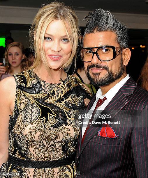 Laura Whitmore and Azim Majid arrive at the Jameson Empire Awards 2013 at The Grosvenor House Hotel on March 24, 2013 in London, England.