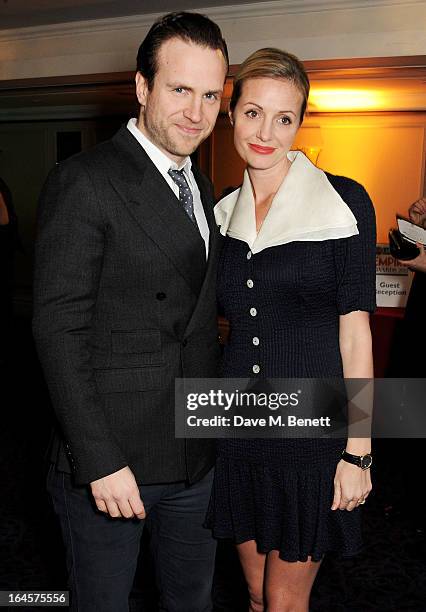 Rafe Spall and Elize du Toit arrive at the Jameson Empire Awards 2013 at The Grosvenor House Hotel on March 24, 2013 in London, England.