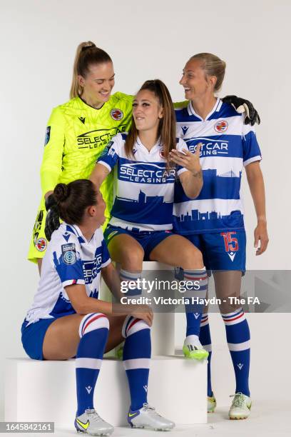 Emily Orman,Brooke Hendrix,Deanna Cooper, Tia Primmer of Reading W.F.C. Pose during the Barclays Women's Championship portrait session at St George's...