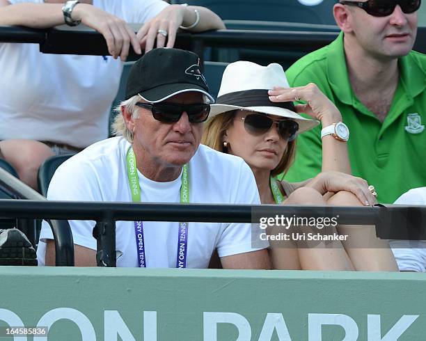 Greg Norman and his wife Kirsten Kutner are sighted at the Sony Tennis Open 2013 at Crandon Park Tennis Center on March 24, 2013 in Key Biscayne,...