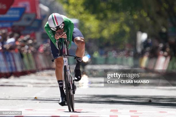 Team Ineos' Italian rider Filippo Ganna crosses the finish line to win the stage 10 of the 2023 La Vuelta cycling tour of Spain, a 25,8 km individual...