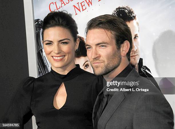 Actress/stunt woman Monique Ganderton and actor/stunt man Sam Hargrave arrives for The Los Angeles Premiere of "Hansel & Gretel: Witch Hunters" held...