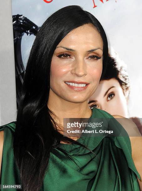 Actress Famke Janssen arrives for The Los Angeles Premiere of "Hansel & Gretel: Witch Hunters" held at TCL Chinese Theater on January 24, 2013 in...