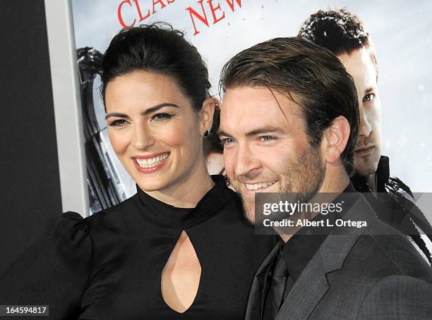 Actress/stunt woman Monique Ganderton and actor/stunt man Sam Hargrave arrives for The Los Angeles Premiere of "Hansel & Gretel: Witch Hunters" held...