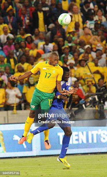 Kagisho Dikgacoi of South Africa and Salif Keita of Central African Republic comeplete for the ball during the FIFA 2014 World Cup Qualifier match...