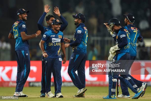 Sri Lanka's players celebrate after winning the Asia Cup 2023 one-day international cricket match between Sri Lanka and Afghanistan at the Gaddafi...