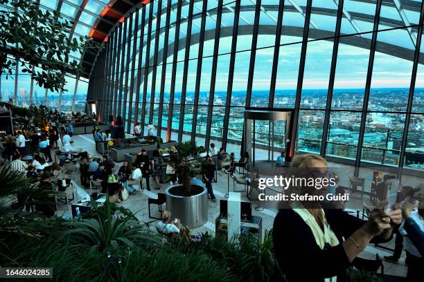 General view of city of London at sunset inside the Sky Garden on August 21, 2023 in London, England. London is the capital of England, many of the...