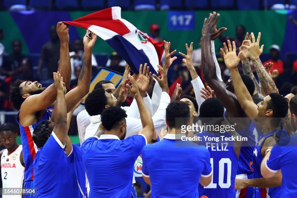 Karl-Anthony Towns of the Dominican Republic celebrates with teammates after the FIBA Basketball World Cup Group A victory over Angola at Araneta...