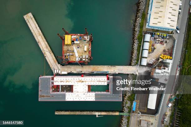 An aerial view of the Bibby Stockholm immigration barge moored in Portland Port, on August 29, 2023 in Portland, England. Lawyers for the Fire...