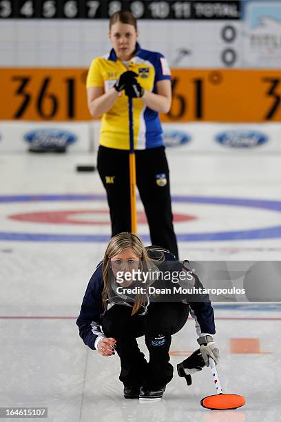 Eve Muirhead of Scotland screams instructions as Maria Wennerstrom of Sweden looks on during the Gold medal match between Sweden and Scotland on Day...