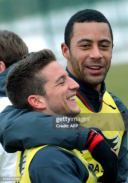 Belgium's national football team midielder Dries Mertens and forward Moussa Dembele take part in a training session on March 25, 2013 at the Neerpede...