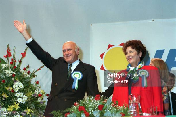 Ruling National Party President Frederick De Klerk and his wife Marike De Klerk greet supporters during a campaign rally in Nasrec exhibition center,...