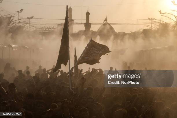 Millions of visitors in the Arbaeen pilgrimage between the shrine of Imam Hussein, the grandson of the Prophet and his brother Al-Abbas, in Karbala,...