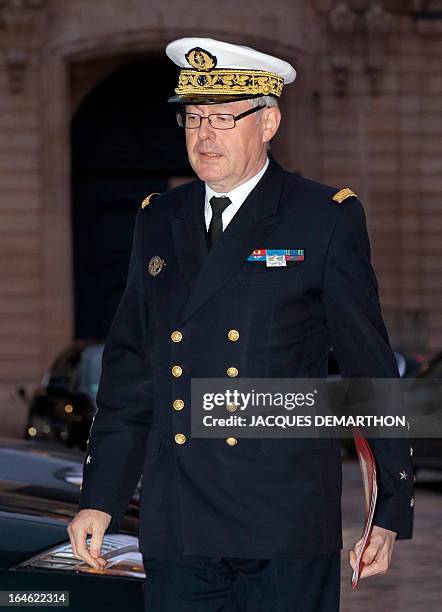 The French army's chief of staff Admiral Edouard Guillaud arrives to attend a meeting on the situation in Mali along with other ministers and members...