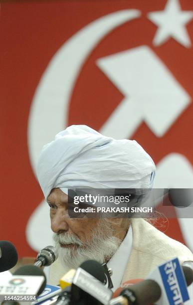 Communist Party of India [CPI] General Secretary Harkishan Singh Surjeet addresses a press conference after releasing the Manifesto for the 14th Lok...