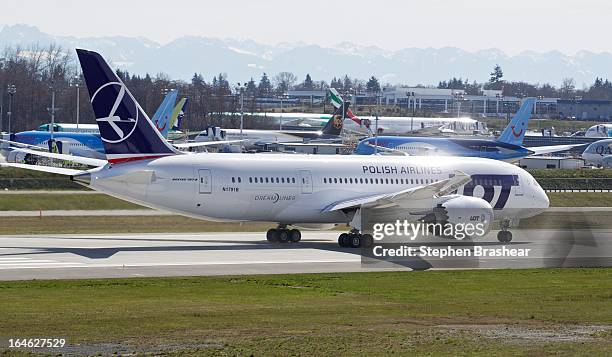 Polish Airlines Boeing 787 Dreamliner, with a redesigned lithium ion battery, prepares to take off during a test flight March 25, 2012 at Paine Field...