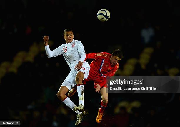 Bamidele Alli of England battles with Alexandr Golovin of Russia during the UEFA European Under-17 Championship Elite Round match between England...