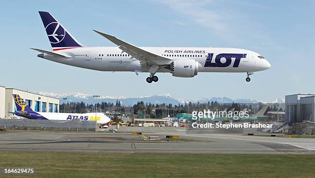Polish Airlines Boeing 787 Dreamliner with a redesigned lithium ion battery lands during a test flight March 25, 2012 at Paine Field in Everett,...